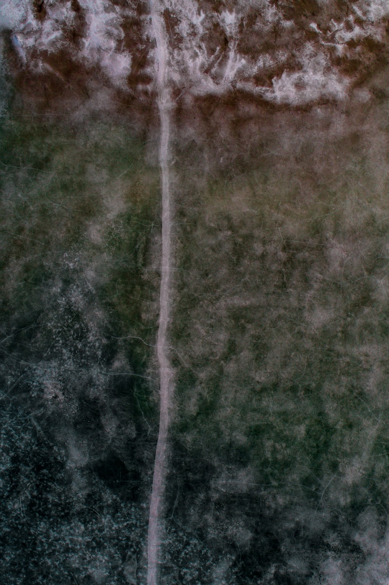 Photo by Nathan Anderson bird's eye view photography of body of water